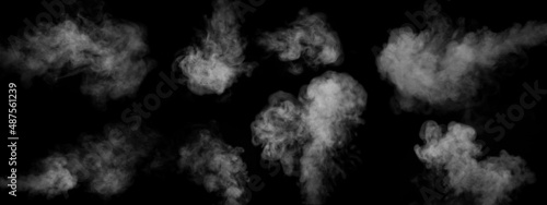 A set of eight different types of swirling, writhing smoke, steam isolated on a black background for overlaying on your photos