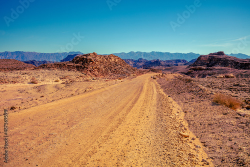 Mountain desert landscape. Dirt road in Timna Park, Eilat, Israel