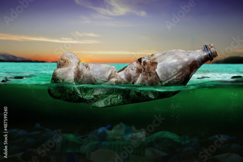 Plastic bottle, pollution that floats in the ocean (Environment concept) 