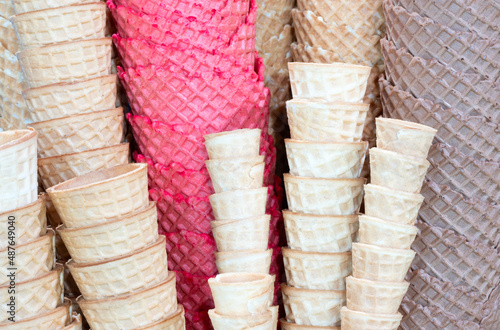 Set of colorful waffle cups for ice cream. Close up.