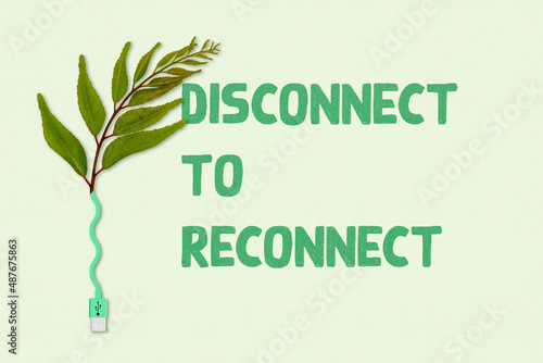 Disconnect to reconnect to nature and self, green leaf plant connected to unplugged USB cord, unplug from technology for mental health concept