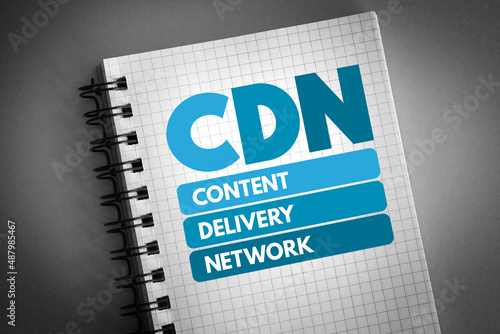 CDN - Content Delivery Network acronym on notepad, technology concept background