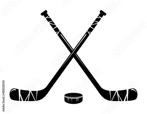 vector crossed hockey sticks and hockey puck