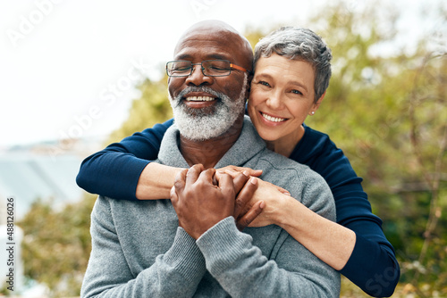 Our love got stronger over the years. Shot of a happy senior couple enjoying quality time at the park.