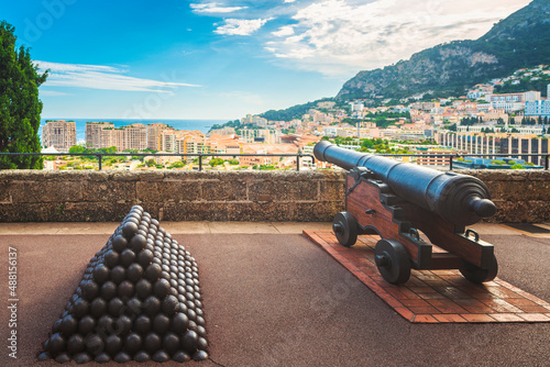 Cannon and cannonballs along Monaco wall ramparts and fort. Montecarlo, Monaco principality