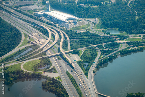 Aerial drone airplane view of cityscape near Oxon Hill in Washington DC with i495 highway capital beltway outer loop with traffic cars and buildings