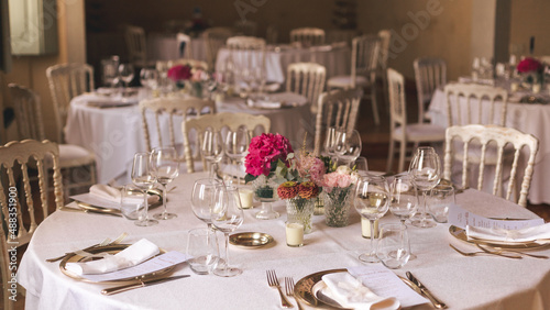 table setting for a wedding celebration with flowers
