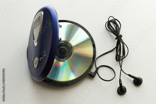 Vintage CD Player with headphones on white background. Vintage Technology from the 90s.