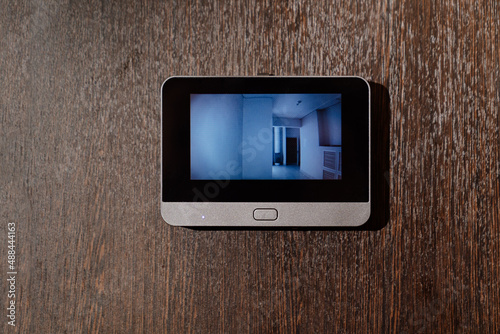 video screen of the peephole or intercom on the front door. 