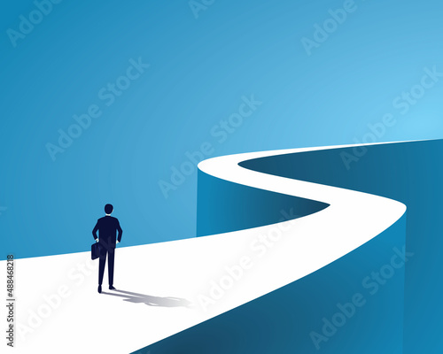 Business journey, businessman walking on long winding path going to success in the future