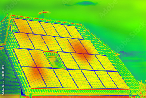 Thermographic inspection of photovoltaic systems by house.Thermovision image of solar panels. Infrared thermovision image. Infrared thermography in inspection of photovoltaic panels. 