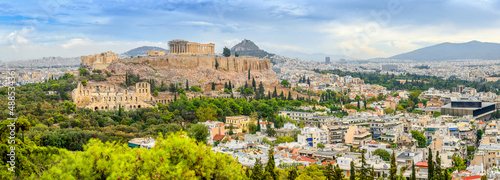 Panorama of Athens with Acropolis hill, Athens, Greece, Europe. The Old Acropolis is the main attraction of Athens. Picturesque view of the remains of the ancient city of Athens.