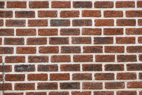 House wall made of dark red brick