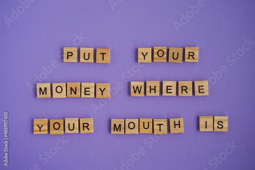 Sayings Put your money where your mouth is on Very Peri background color 2022