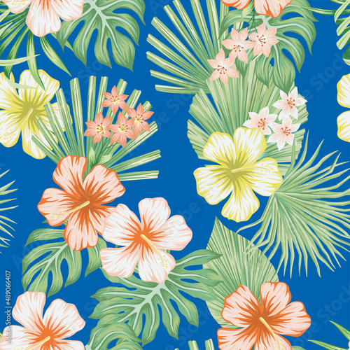 Tropical vintage hibiscus flower, palm leaves floral seamless pattern blue background. Exotic jungle wallpaper.