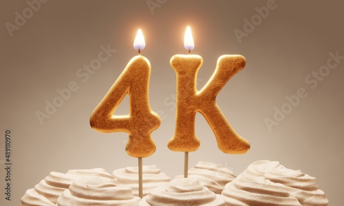 Milestone cake celebrating 4000 followers or subscribers. Golden ‘4k’ number candles on cake with icing in neutral tones. 3D rendering