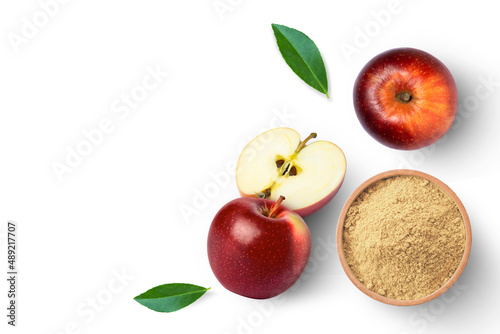 Apple pectin fiber powder in wooden bowl and fresh red apple on white background. Top view. Flat lay.