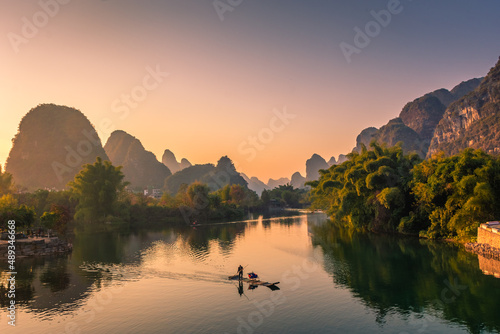 YANGSHUO, CHINA, 6 DECEMBER 2019: Beautiful sunset on the Yulong River in Yangshuo, Guilin, Guangxi