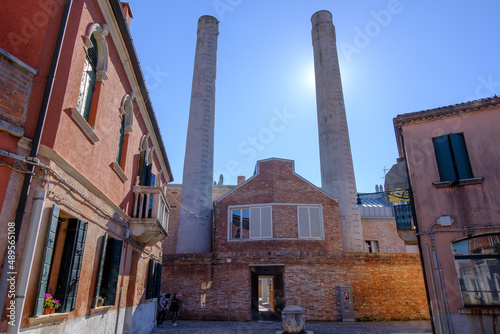 smokestack of an old factory in murano, venice, italy