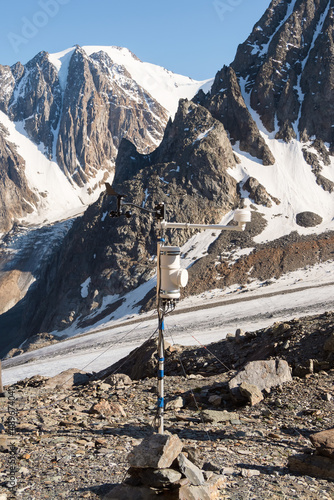 Automatic weather station in the mountains. Vertical view.