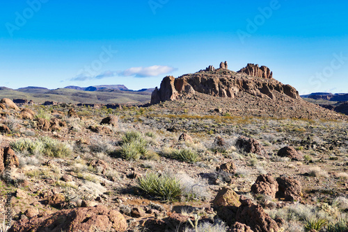 Heavily eroded rock formation along the Monolith Garden Trail in the Mojave Desert near Kingman, Arizona, USA 