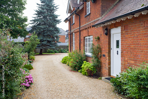 Garden and gravel driveway, English country house UK