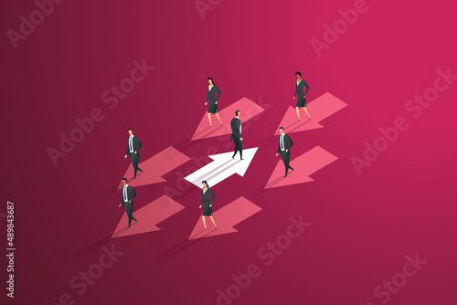 Businessman walking on arrow walking in the opposite direction to group businessmen.