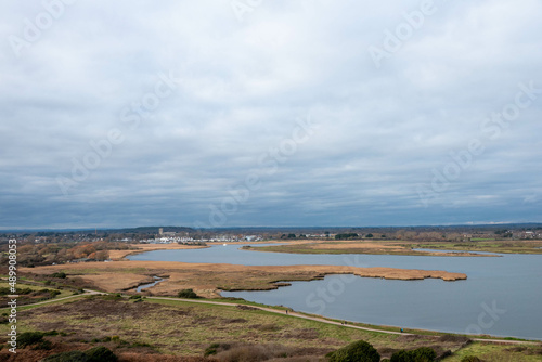 view from Hengistbury Head Dorset England with Christchurch Priory in the background