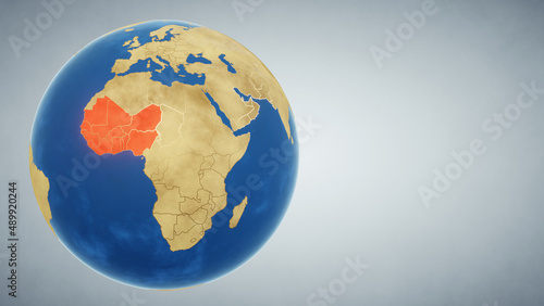 Earth globe with region of West Africa highlighted in red. 3D illustration. Elements of this image furnished by NASA