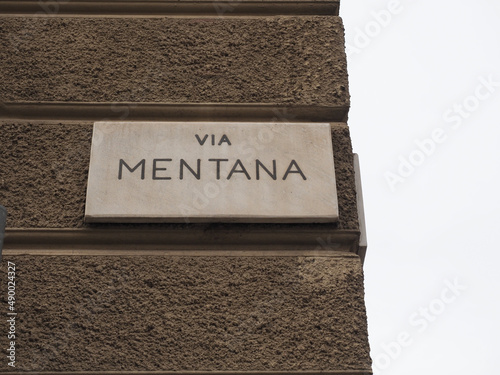 via Mentana street sign