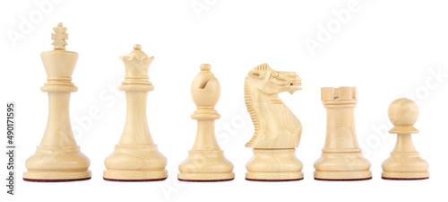 Row of wooden chess pieces on white background