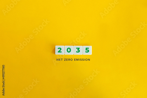 2035 Net Zero Emission Banner. Block letters on bright orange background. Minimal aesthetics.