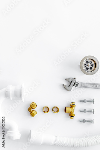 Professional instruments for plumber on white background top view space for text