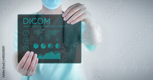 DICOM (Digital Imaging Communications in Medicine). Doctor holding virtual letter with text and an interface. Medicine in the future