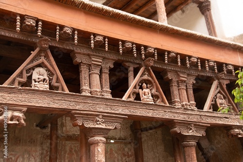 Ancient wooden carving on the entrance to Alchi monastery in Ladakh, India. Alchi monastery is a famous Buddhist temple near Leh, Ladakh, India..