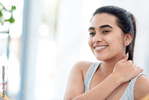 That skincare really paid off. Shot of young woman smiling happily.