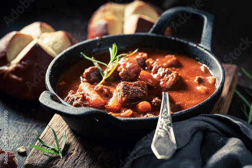 Hot and tasty goulash served with fresh hot buns