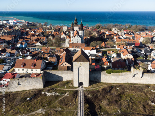 Aerial view of fhe Dalmansporten, or Dalman gate, along the medieval city wall of Visby in the Gotland island in Swedeon on a sunny winter day