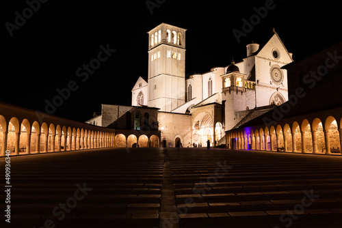 Assisi Basilica by night, Umbria region, Italy. The town is famous for the most important Italian Basilica dedicated to St. Francis - San Francesco.