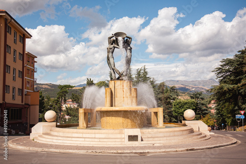 L'aquila, Italy, fountain with water jets. Fountain spraying water