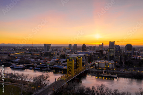 Aerial views of downtown Sacramento skyline and bridges.