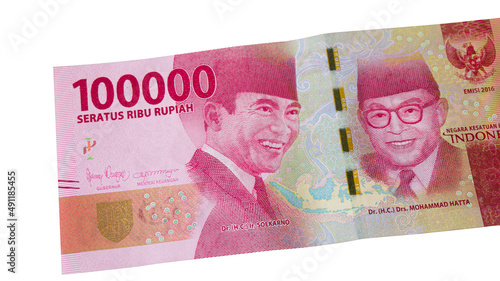 Indonesian money in the hundred thousand rupiah denomination isolated on white background
