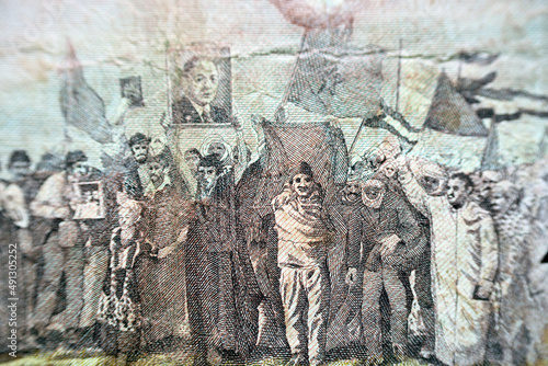 Image of The Green March into the Spanish Sahara October 1975 and Desert rose from the reverse side of 100 one hundred Moroccan Dirhams banknote issued in 1987 by bank Al-Maghrib, old Moroccan money