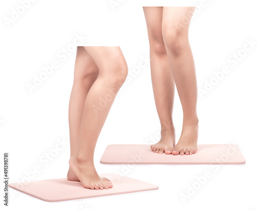 Set of woman standing on stone bath mat isolated on a white background.