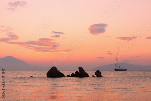 Epic sunrise over the Aegean Sea with view to the Greek Islands of Samos and Fourni.