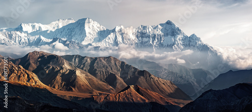 Panoramic view of snow mountains range landscape