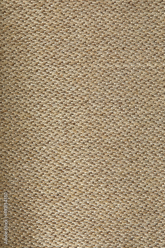 Biege linen cloth close-up background. Fabric beige teak canvas texture