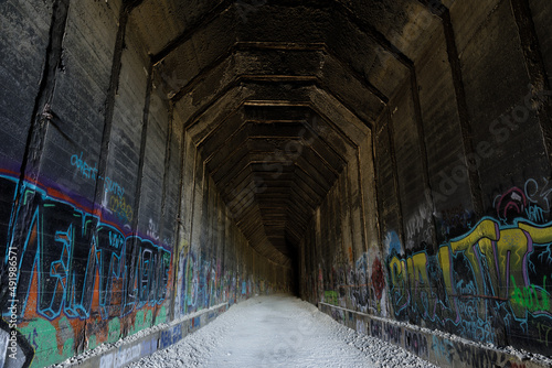 Donner Pass Summit train tunnel covered with graffiti. Sierra Nevada of California, USA.