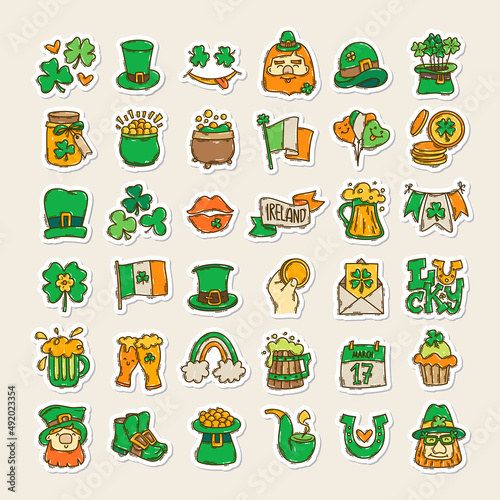 Colorful St. Patrick's Day doodle style hand-drawn sticker set with simple engraving effect. Cute Irish holiday symbols and elements collection.