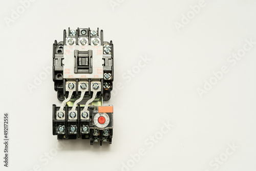 Magnetic contactor with Overload Relay isolate on white background. The magnetic contactors used to control the distribution of power in lighting and heating circuits.